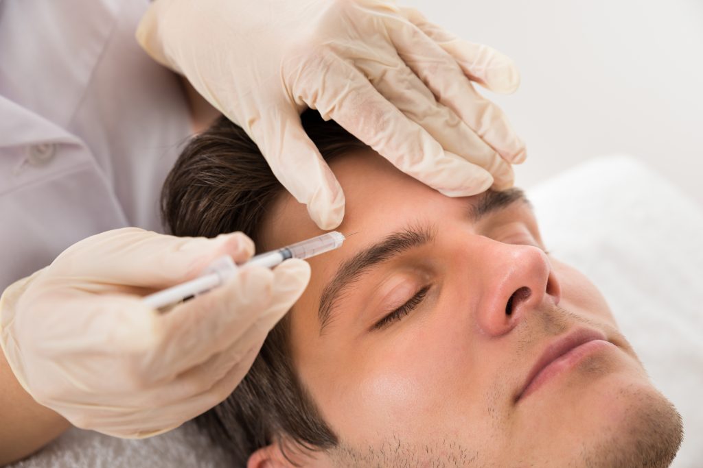 Man getting a botox treatment