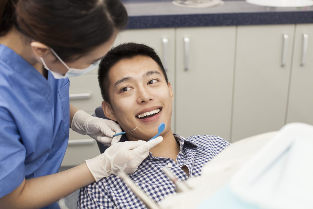 Man having a dental check up