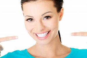 Woman showing her white teeth
