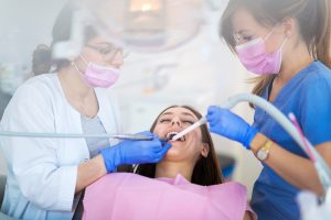 Dentist doing prophylaxis