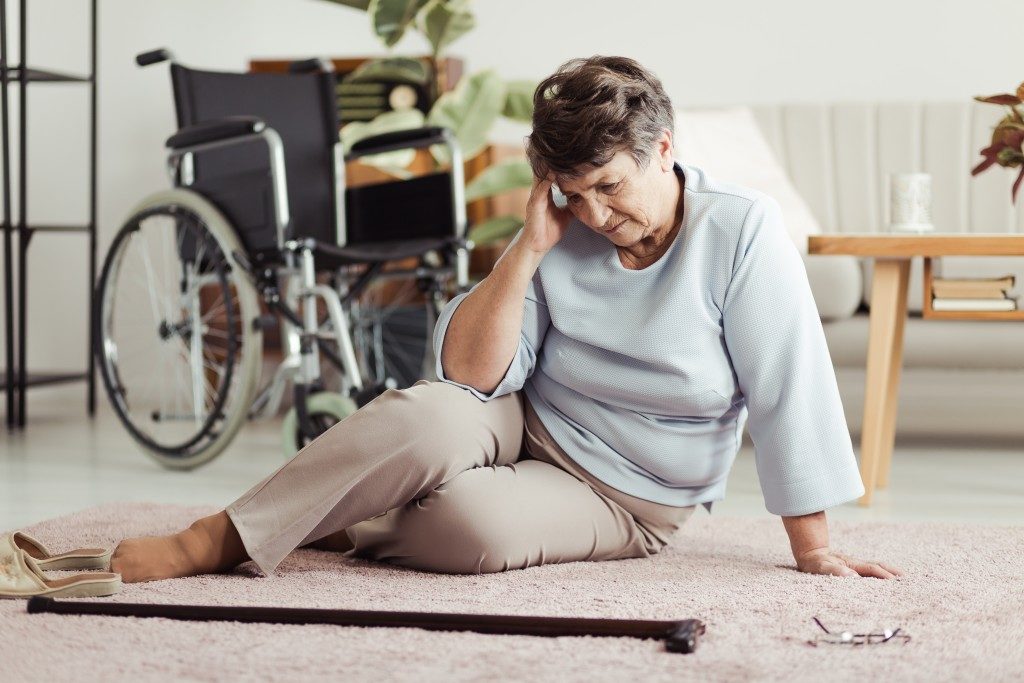 Old lady suffering from parkinson disease