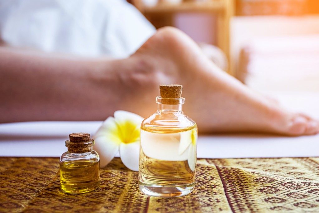 herbal oil applied on foot