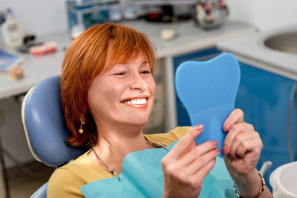 a senior woman at the dentist