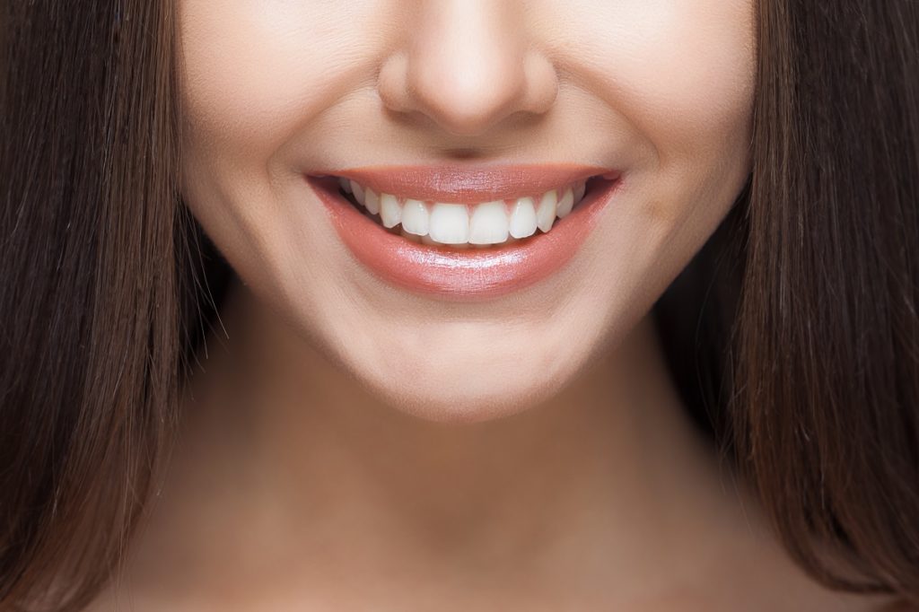Woman smiling close up