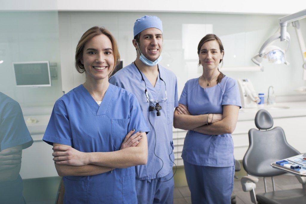 Group of dentists and their assistants
