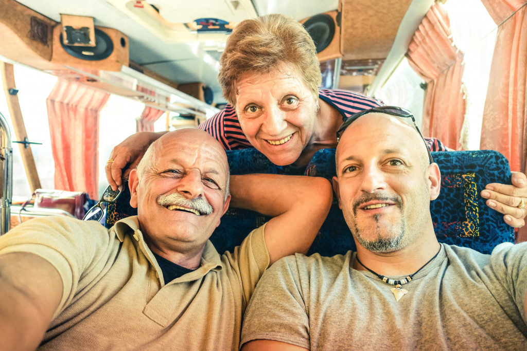 son with elderly parents