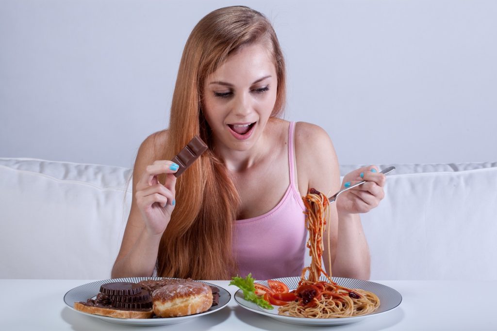 woman eating junk food