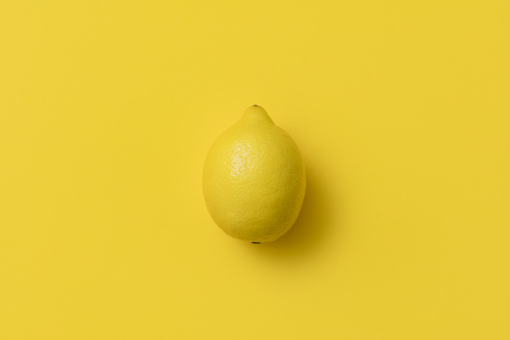 lemon fruit in a yellow background