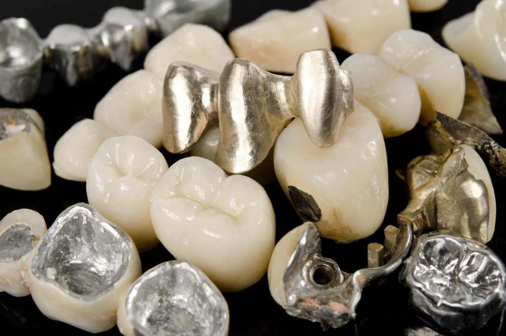 Dental crowns on top of teeth