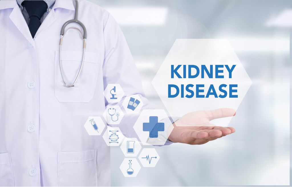doctor with kidney disease on hand
